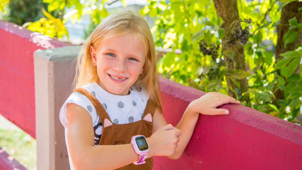 Girl with tracker using cellular IoT